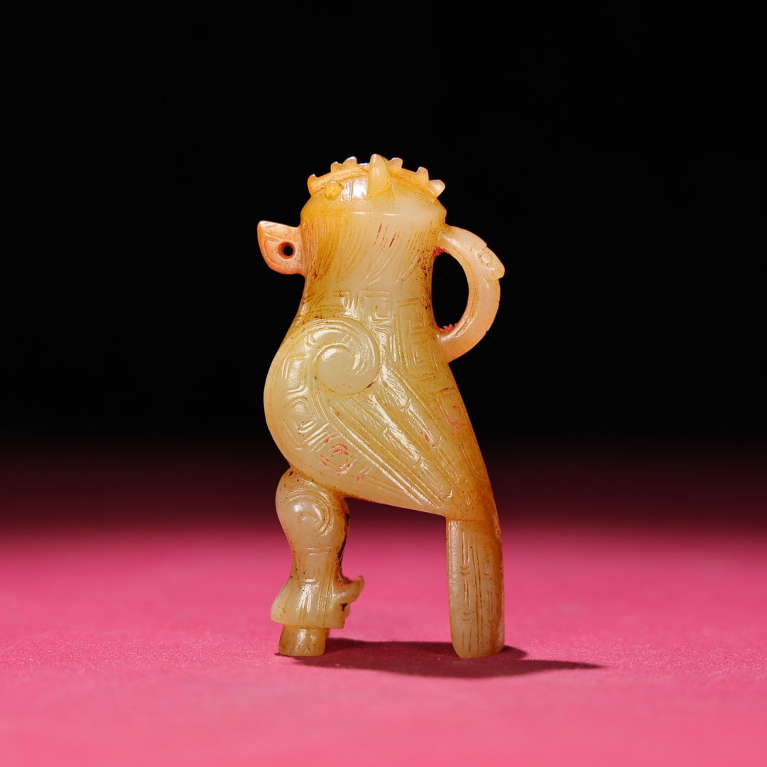 An Exquisite White Jade Phoenix Ornament: An Exquisite White Jade Phoenix Ornament Han Dynasty, China Size:3.1inx0.9inx1.3in Weight:89g白玉凤鸟 中国汉代 Size:7.8cmx2.4cmx3.3cm Weight:89g