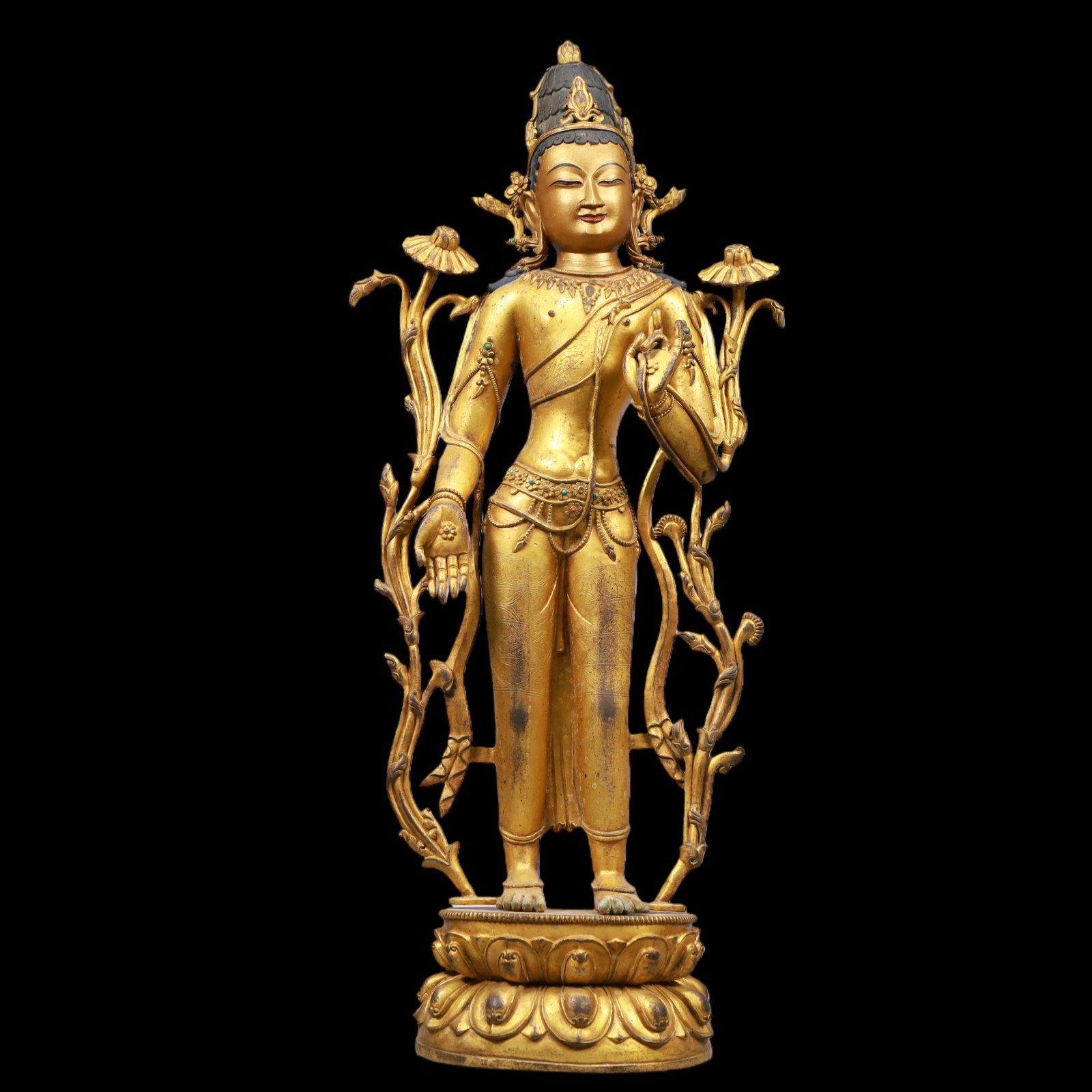An Exquisite Gilt Bronze Inlaid Gems Statue of Tara: An Exquisite Gilt Bronze Inlaid Gems Statue of Tara Ming Dynasty, China Size:6.3inx4.7inx24.4in Weight:7800g铜鎏金嵌百宝度母佛像 中