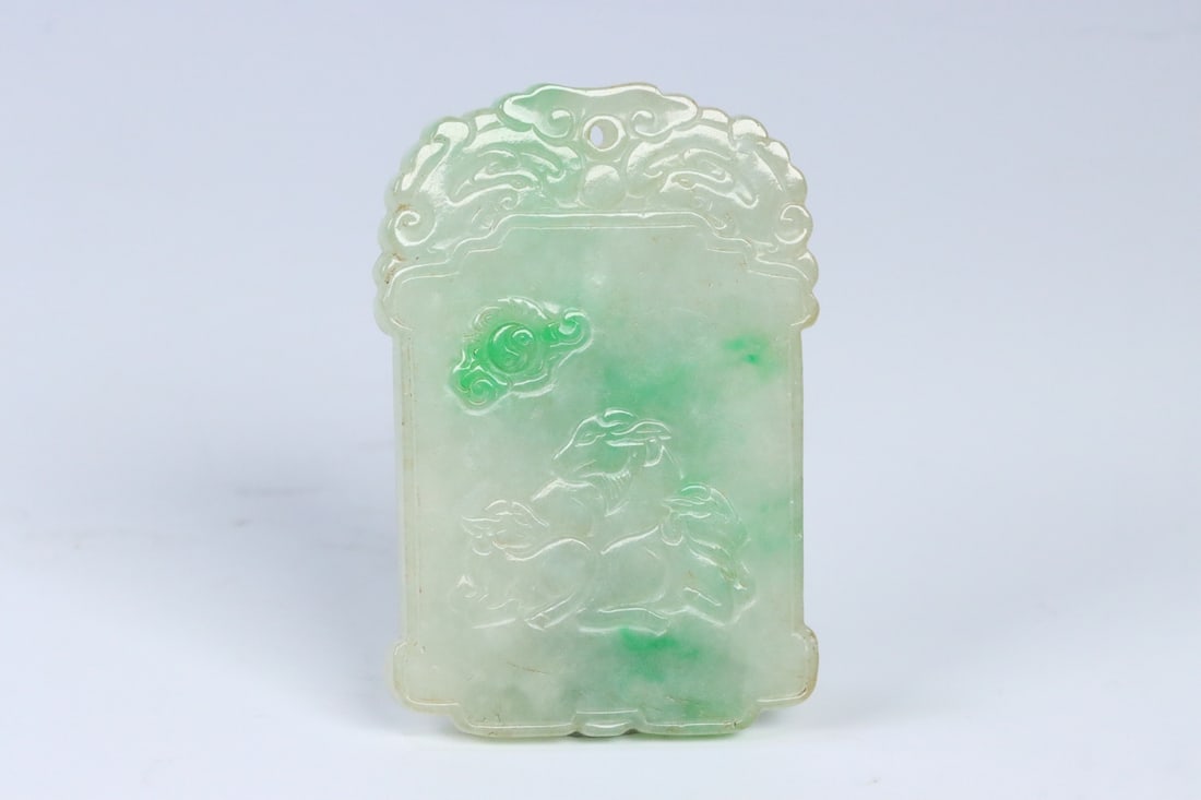 An Exquisite Jadeite Sheep Pattern Brand: An Exquisite Jadeite Sheep Pattern Brand Qing Dynasty, China Size:2.4inx1.6inx0.2in Weight:33g翡翠飘绿三羊开泰牌 中国清代 