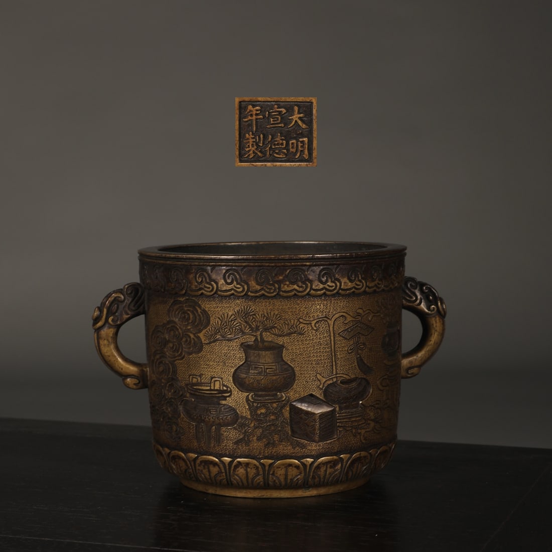 An Exquisite Bronze Flower Pattern Double-Ears Censer: An Exquisite Bronze Flower Pattern Double-Ears Censer Ming Dynasty, China Xuande Six-character Mark Size:3.7inx5.8in Weight:1250g铜牛郎织女图筒式炉