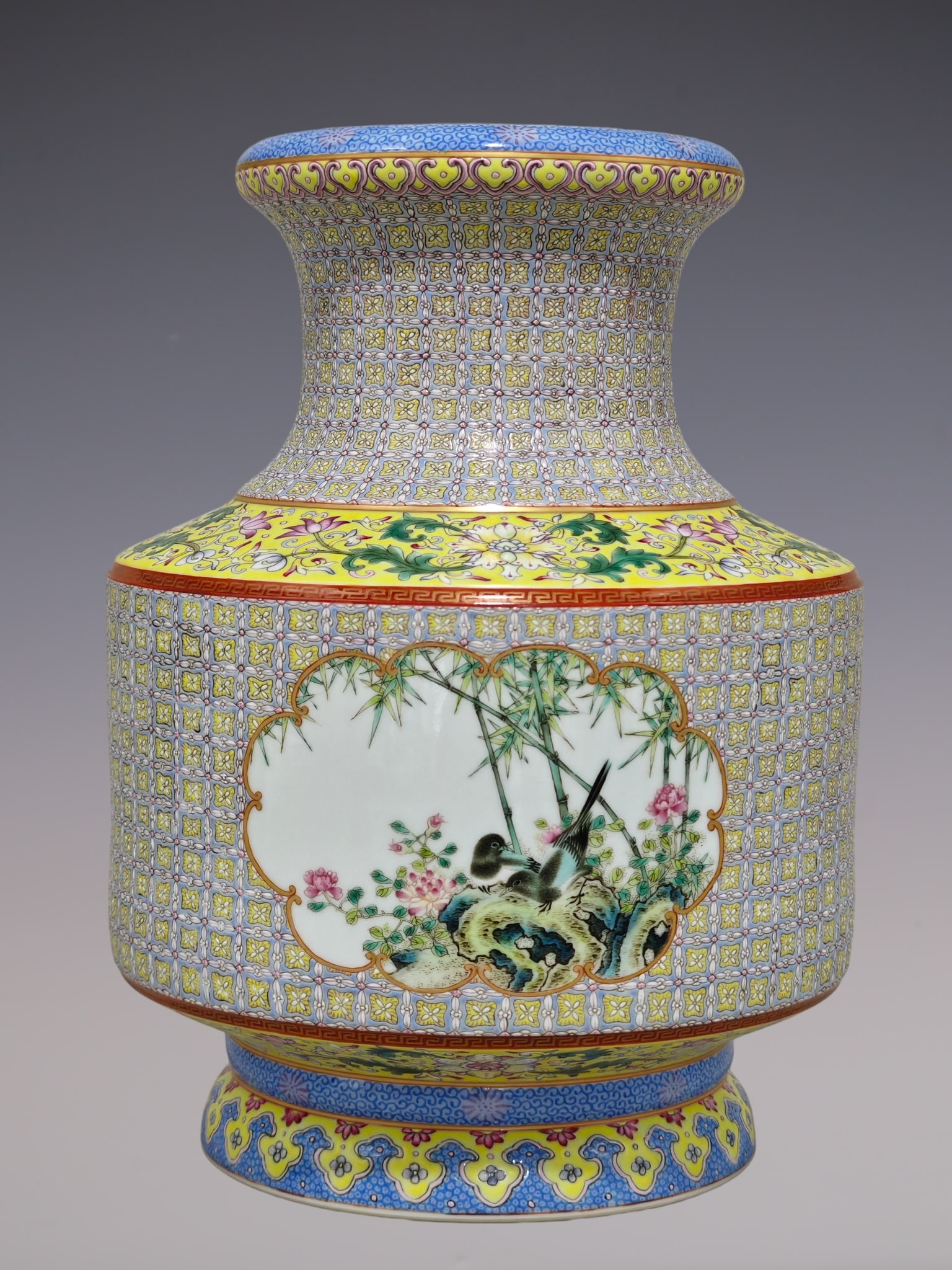 An Exquisite Famille-Rose Flower and Bird Pattern Lotus Pattern Vase: An Exquisite Famille-Rose Flower and Bird Pattern Lotus Pattern Vase Qing Dynasty, China Qianlong Six-character Mark