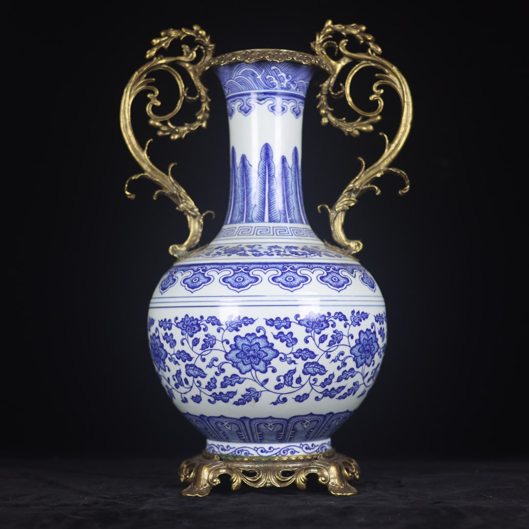 An Exquisite Blue and White Inlaid Bronze Lotus Pattern Double-Ears Vase: An Exquisite Blue and White Inlaid Bronze Lotus Pattern Double-Ears Vase Qing Dynasty, China Qianlong Six-character Mark