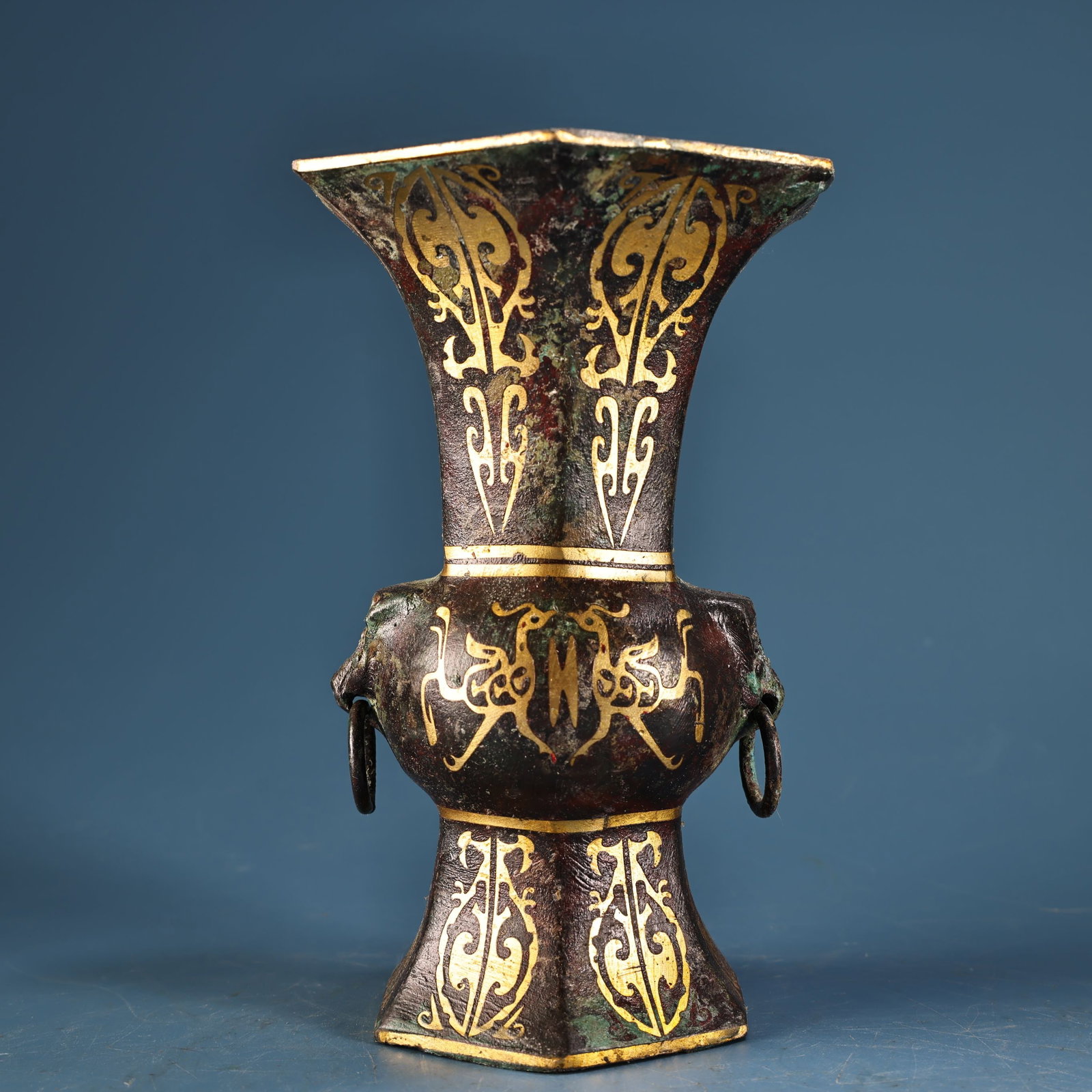 An Exquisite Bronze Inlaid Gold Phoenix Pattern Double-Ears Vase: An Exquisite Bronze Inlaid Gold Phoenix Pattern Double-Ears Vase Han Dynasty, China Size:6.3inx3.9in Weight:700g青铜错金花瓶 中国汉代 Size:1