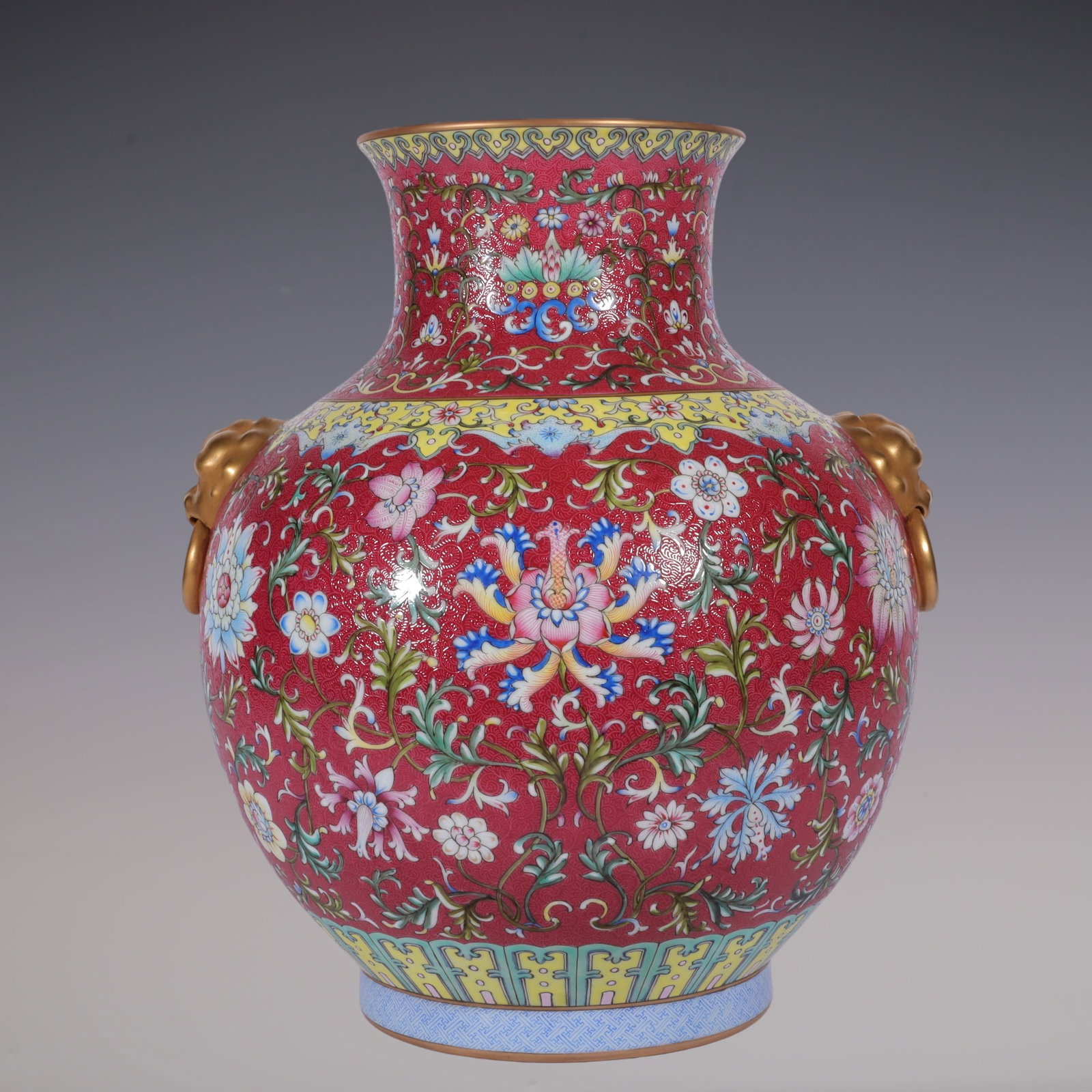 An Exquisite Famille-Rose Ruby Red-Glazed Lotus Pattern Double-Ears Vase: An Exquisite Famille-Rose Ruby Red-Glazed Lotus Pattern Double-Ears Vase Qing Dynasty, China Qianlong Four-character Mark