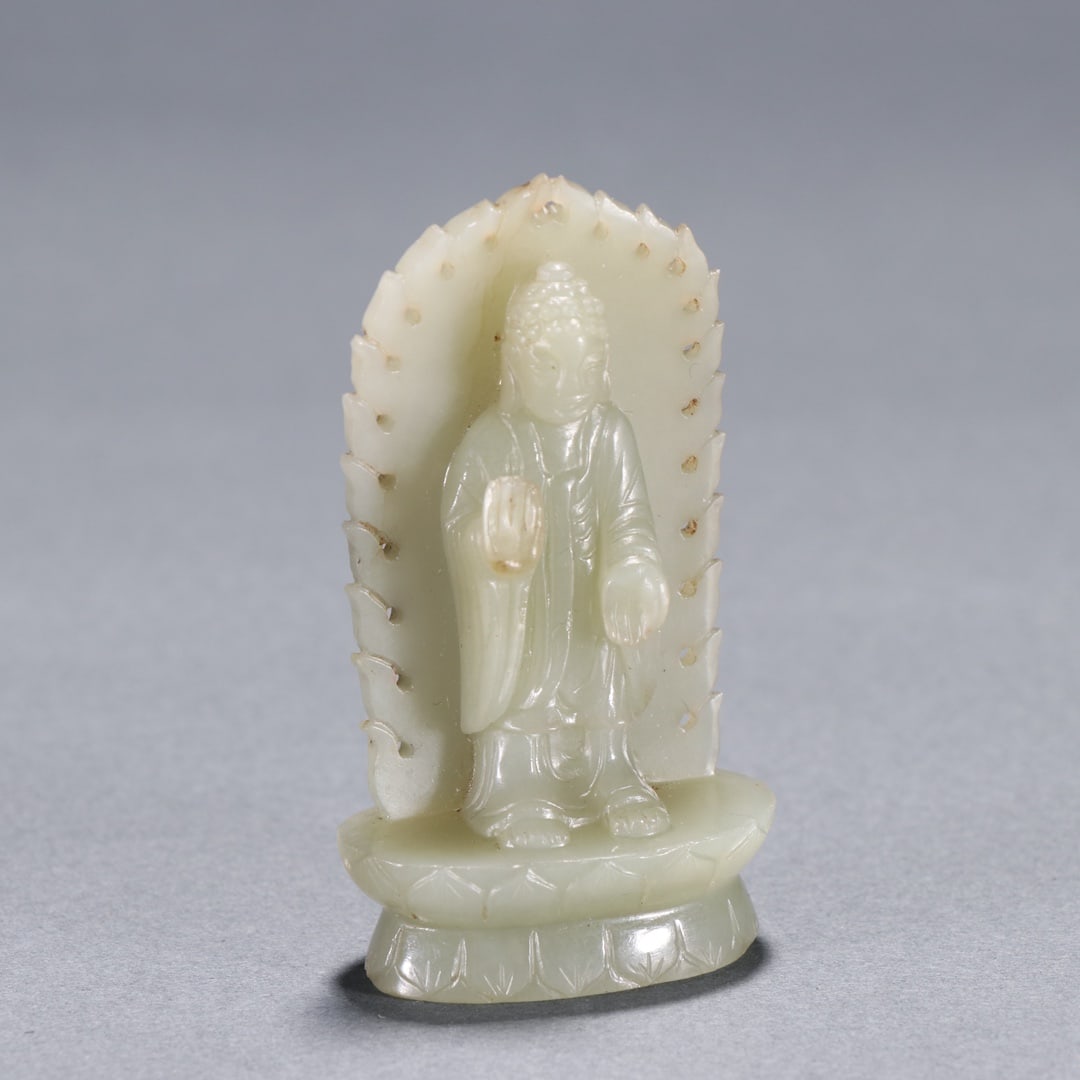 An Exquisite White Jade Buddha Statue: An Exquisite White Jade Buddha Statue Qing Dynasty, China Size:2.4inx1.3in Weight:42.8g白玉佛 中国清代 Size:6.2cmx3.3cm Weight:42.8g