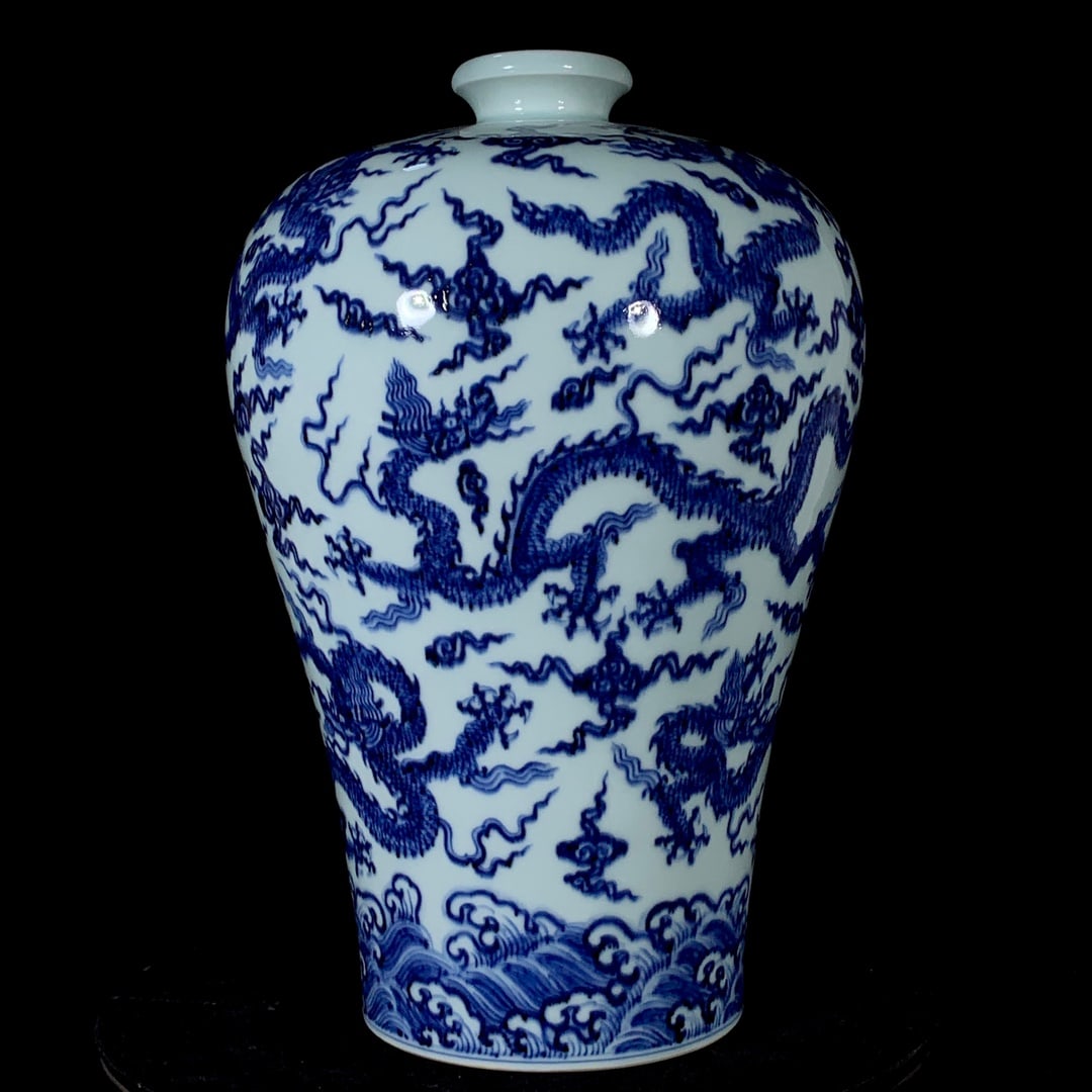 An Exquisite Blue and White Dragon Pattern Seawater Pattern Vase: An Exquisite Blue and White Dragon Pattern Seawater Pattern Vase Ming Dynasty, China Size:13.4inx9.1in青花九龙闹海纹梅瓶