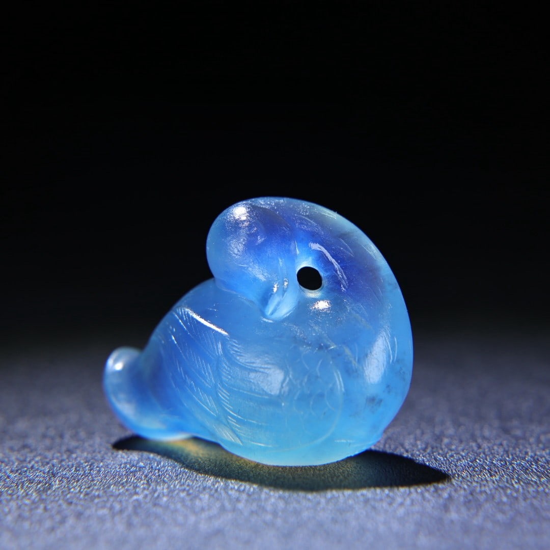 An Exquisite Aquamarine Goose Pendant: An Exquisite Aquamarine Goose Pendant Han Dynasty, China Size:1.7inx1.3inx0.8in Weight:30g海蓝宝鹅挂件 中国汉代 Size:4.3cmx3.2cmx2.1cm