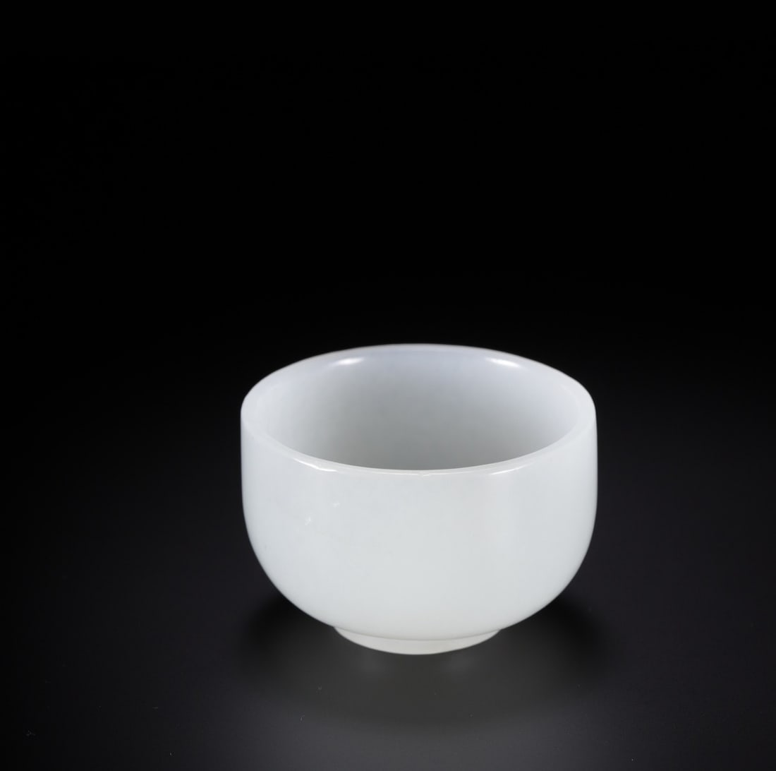 An Exquisite White Jade Cup: An Exquisite White Jade Cup Qing Dynasty, China Size:1.5inx2.2in Weight:61.5g白玉杯 中国清代 Size:3.7cmx5.6cm Weight:61.5g