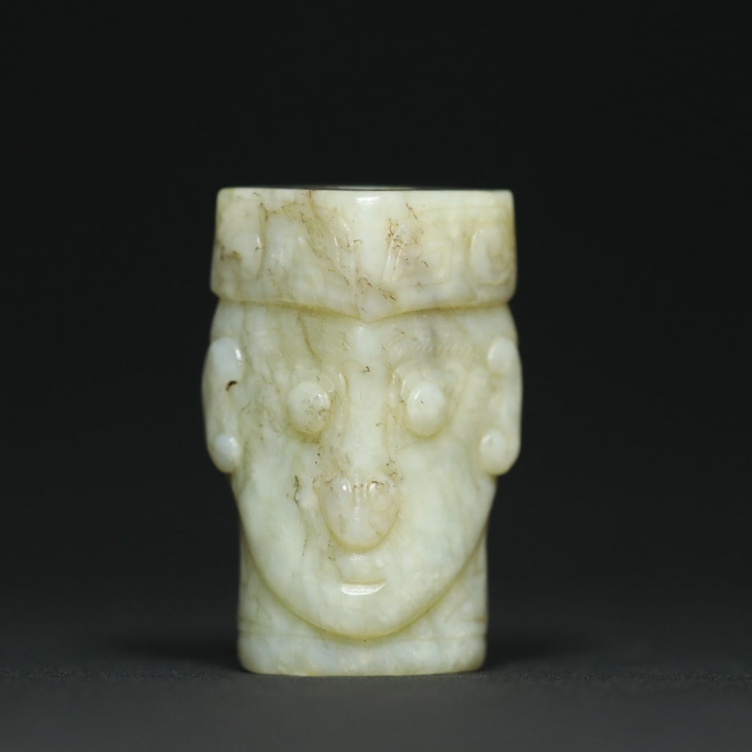 An Exquisite White Jade Human facial motif Pendant: An Exquisite White Jade Human facial motif Pendant Shi jia he Culture Size:1.5inx1inx1in Weight:36.5g白玉人面纹玉人首勒子挂件