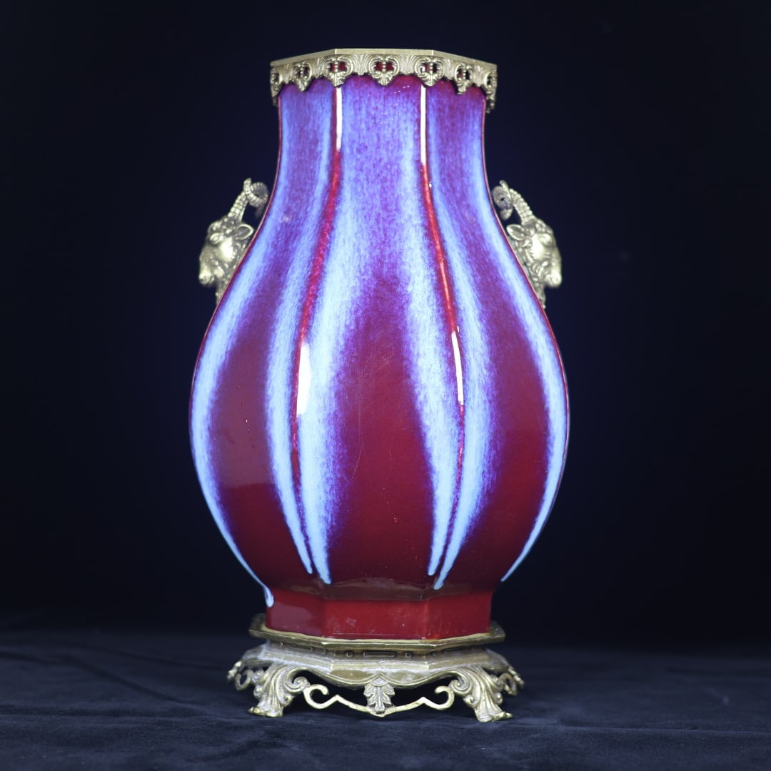 An Exquisite Flambe Glazed Inlaid Bronze Double-Ears Vase: An Exquisite Flambe Glazed Inlaid Bronze Double-Ears Vase Qing Dynasty, China Yongzheng Six-character Mark Size:17.3inx9.4in窑变釉镶铜羊头双耳