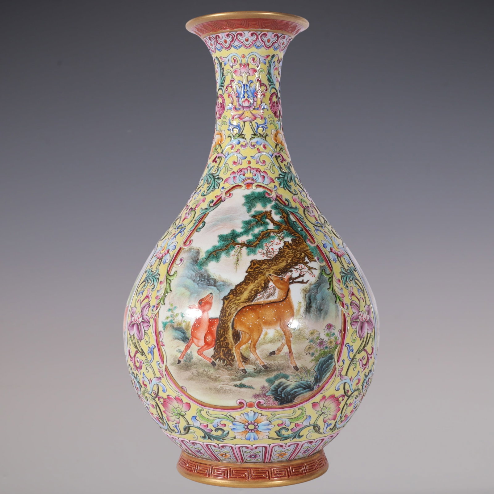 An Exquisite Enamel Lotus Pattern Animal Pattern Vase: An Exquisite Enamel Lotus Pattern Animal Pattern Vase Qing Dynasty, China Qianlong Six-character Mark Size:11.5inx6.3in珐琅彩黄地雕刻开窗走&