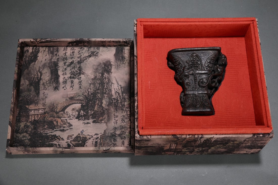 An Exquisite Eaglewood Beast-Face Pattern Goblet: An Exquisite Eaglewood Beast-Face Pattern Goblet Qing Dynasty, China Size:4.3inx3.3inx4.7in沉香爵杯 中国清代 Size:11cmx8.3cmx12cm