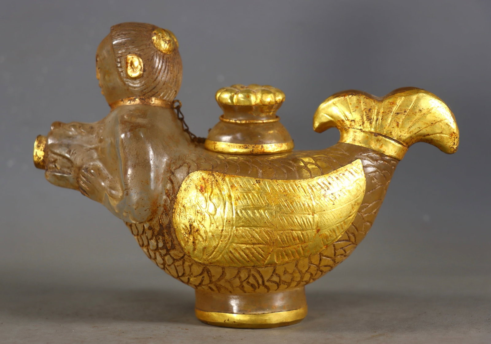 An Exquisite Crystal Cover with Gold Ewer: An Exquisite Crystal Cover with Gold Ewer Qing Dynasty, China Size:6.1inx8.1inx3.1in Weight:1607g水晶包金鱼人壶 中国清代