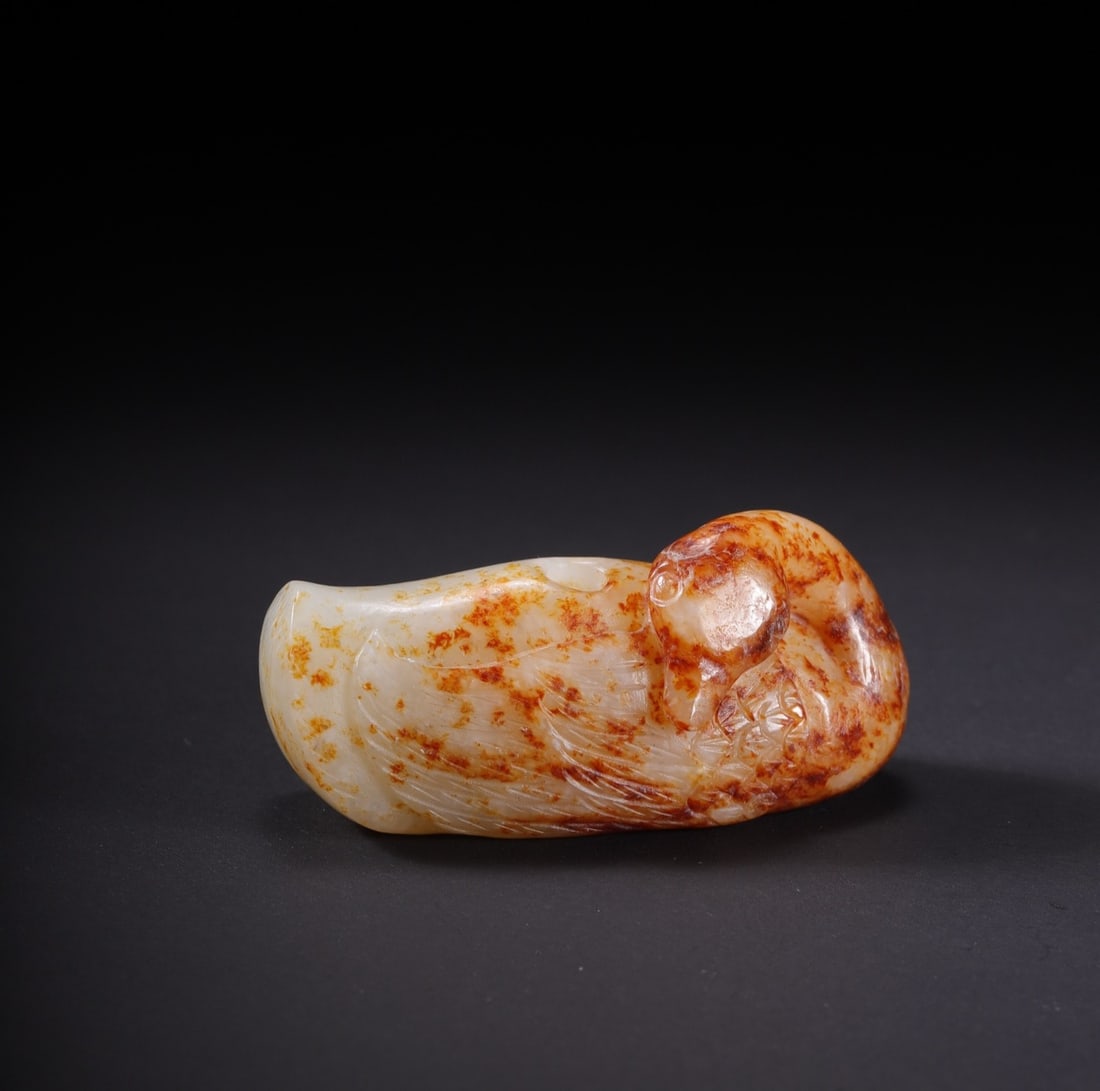 An Exquisite White Jade Goose: An Exquisite White Jade Goose Qing Dynasty, China Size:1.8inx0.9inx0.8in Weight:27.8g白玉鹅 中国清代 Size:4.6cmx2.2cmx2.0cm Weight:27.8g