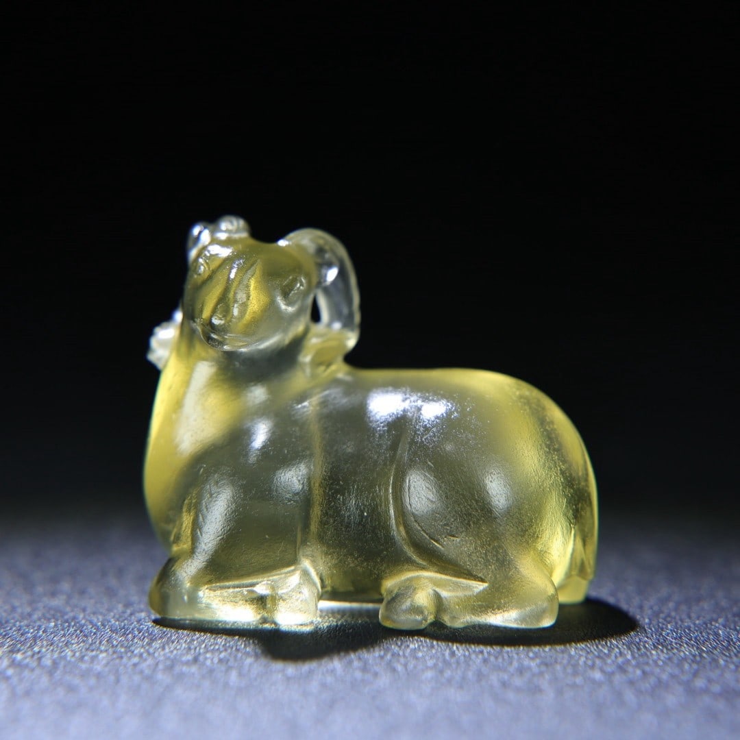 An Exquisite Crystal Sheep Hand Piece: An Exquisite Crystal Sheep Hand Piece Han Dynasty, China Size:2inx1.5inx1.2in Weight:70g水晶羊把件 中国汉代 Size:5.1cmx3.8cmx3.1cm Weight:70g