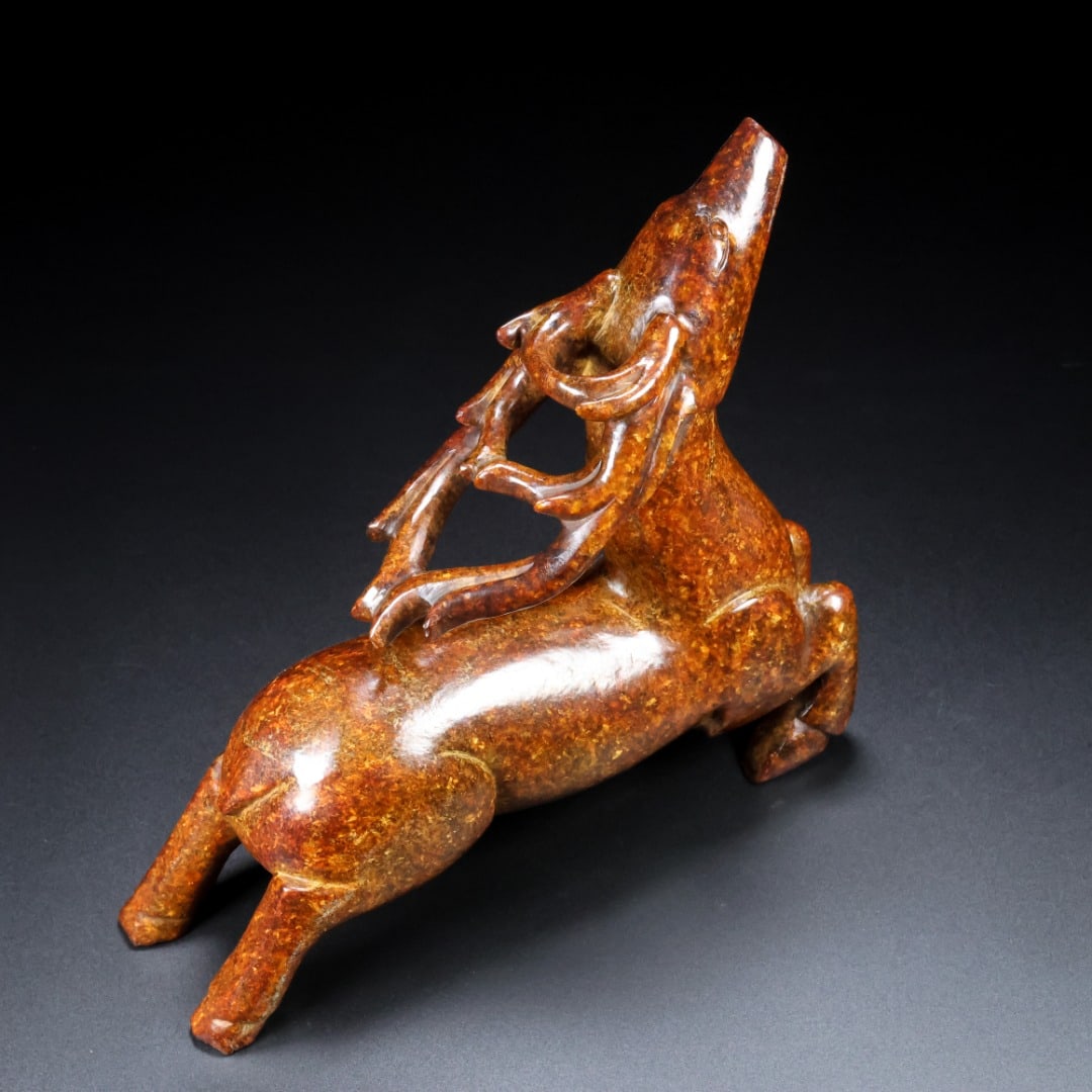 An Exquisite White Jade Deer Ornament: An Exquisite White Jade Deer Ornament Han Dynasty, China Size:8.3inx8inx2.5in Weight:1.49kg白玉鹿摆件 中国汉代 Size:21cmx20.3cmx6.3cm Weight:1.49k
