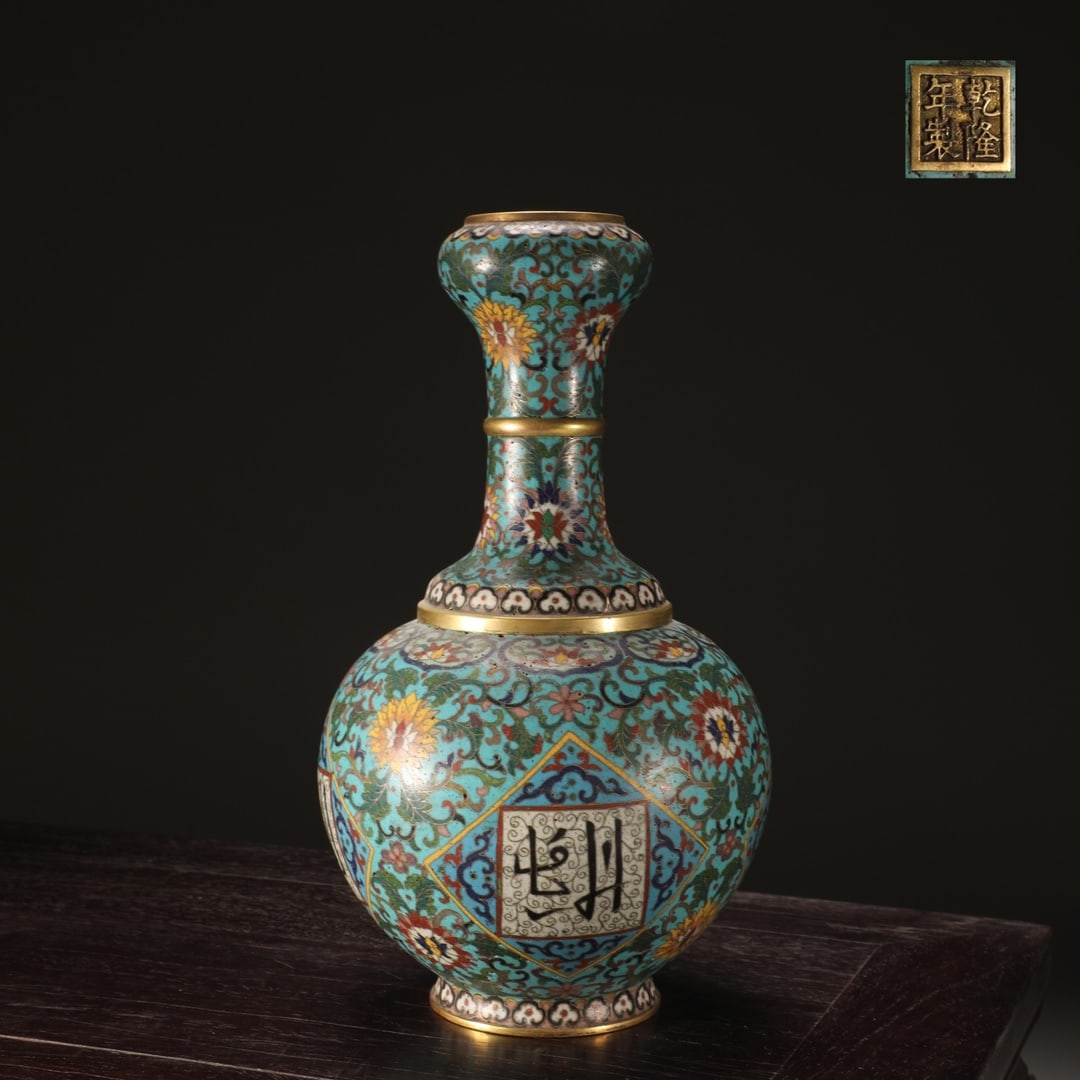 An Exquisite Cloisonne Lotus Pattern With Sanskrit Vase: An Exquisite Cloisonne Lotus Pattern With Sanskrit Vase Qing Dynasty, China Qianlong Four-character Mark Size:10.4inx5.7in