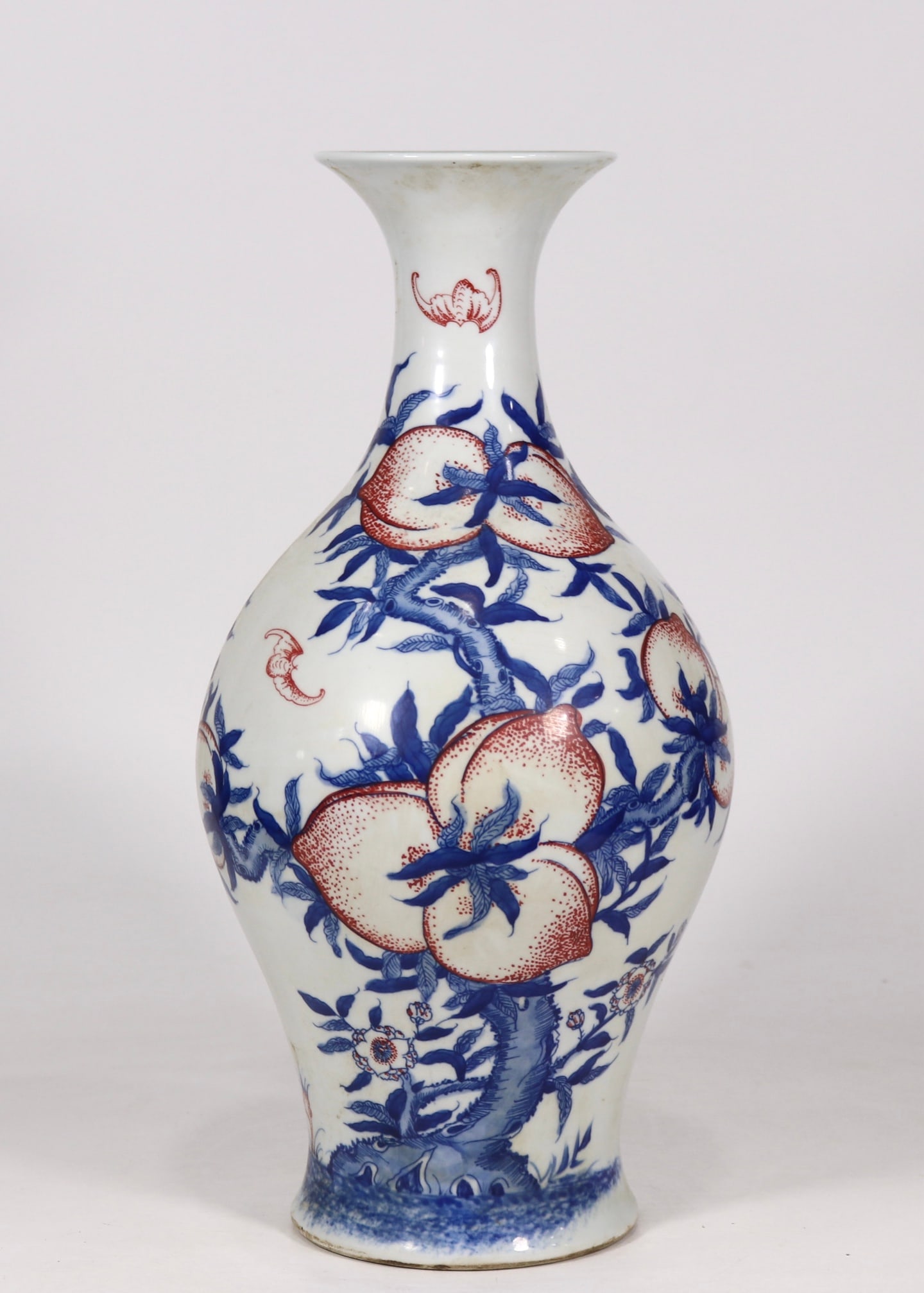 An Exquisite Blue and White Underglaze-Red Bats and Peach Pattern Vase: An Exquisite Blue and White Underglaze-Red Bats and Peach Pattern Vase Qing Dynasty, China Yongzheng Six-character Mark Size:16.1inx7.3in青花釉里红寿桃蝙