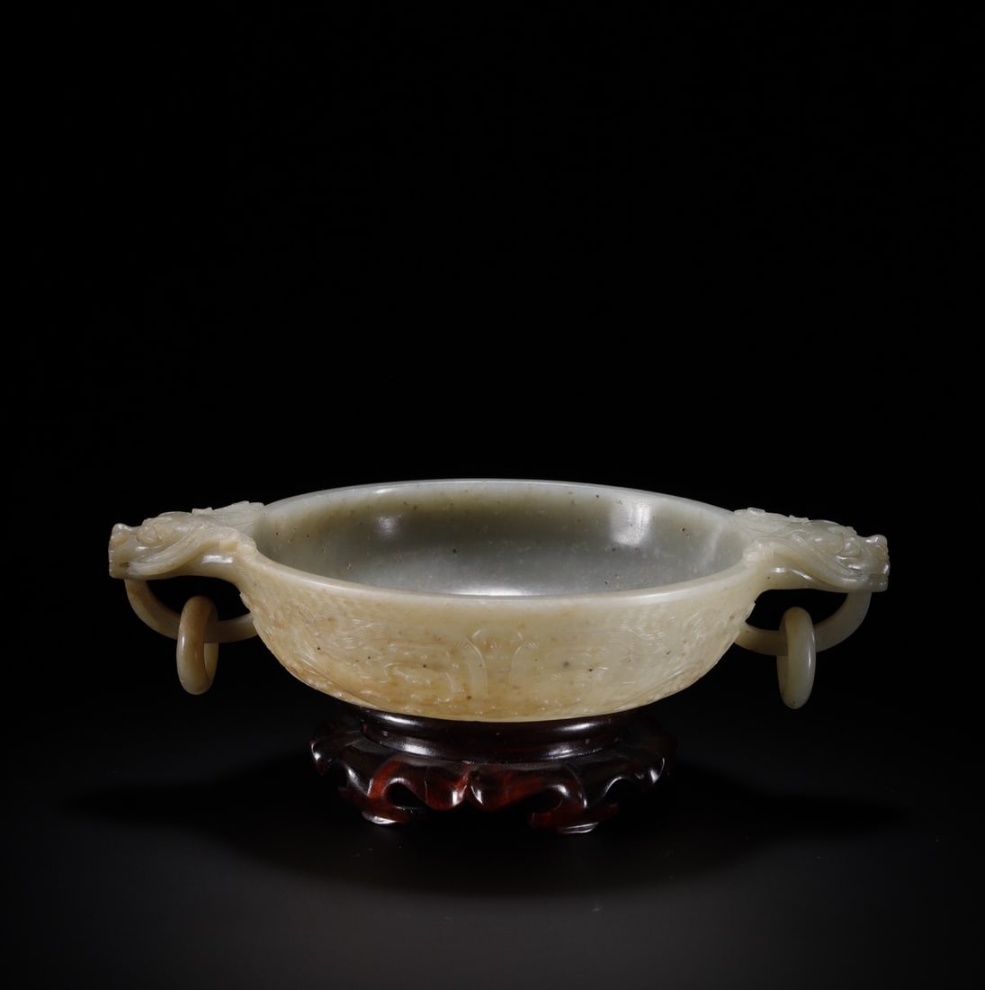 An Exquisite White Jade Beast-Face Pattern Double-Ears Plate: An Exquisite White Jade Beast-Face Pattern Double-Ears Plate Qing Dynasty, China Size:8.3inx5.9inx1.7in Weight:477.5g白玉龙耳盘 中国清代 Size:21cm