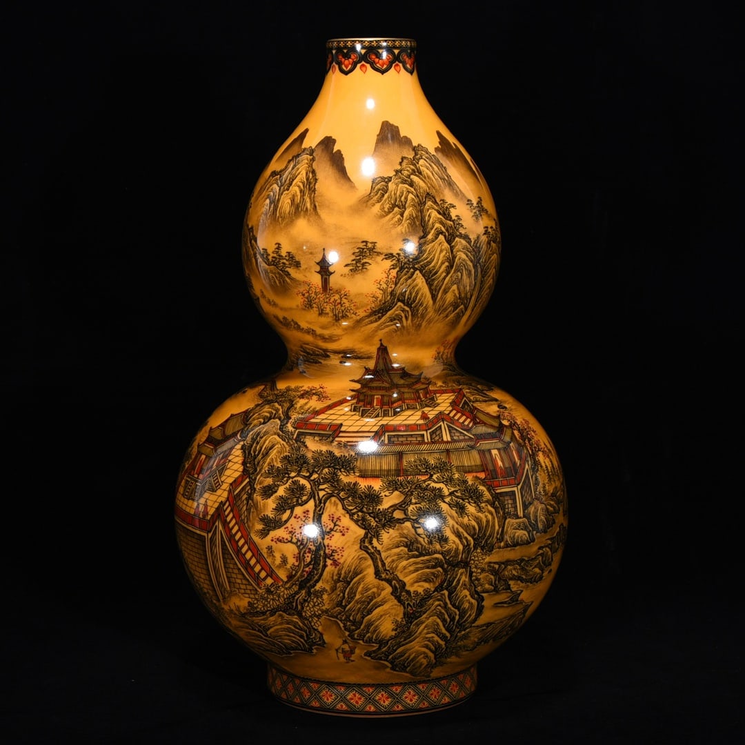 An Exquisite Ink Color Landscape Pattern Gourd-Shaped Vase: An Exquisite Ink Color Landscape Pattern Gourd-Shaped Vase Qing Dynasty, China Qianlong Six-character Mark Size:15.4inx9.3in黄地山水阁楼纹葫芦
