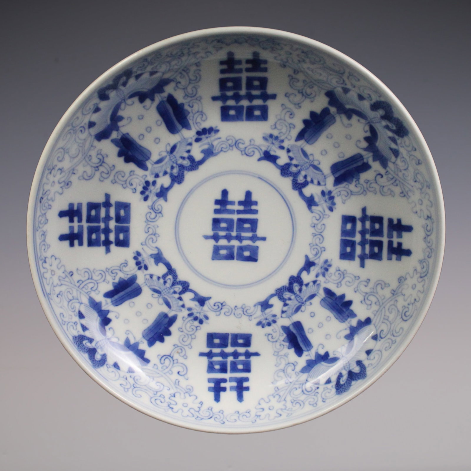 An Exquisite Blue and White Flower and Butterfly Pattern Plate: An Exquisite Blue and White Flower and Butterfly Pattern Plate Qing Dynasty, China Jiaqing Six-character Mark Size:7.7inx4.6in喜福临门青花盘
