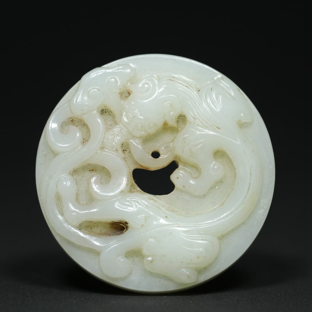 An Exquisite White Jade Chi-Dragon Pattern Pendant: An Exquisite White Jade Chi-Dragon Pattern Pendant Ming Dynasty, China Size:1.9inx0.5in Weight:51.3g白玉螭龙纹玉璧挂件