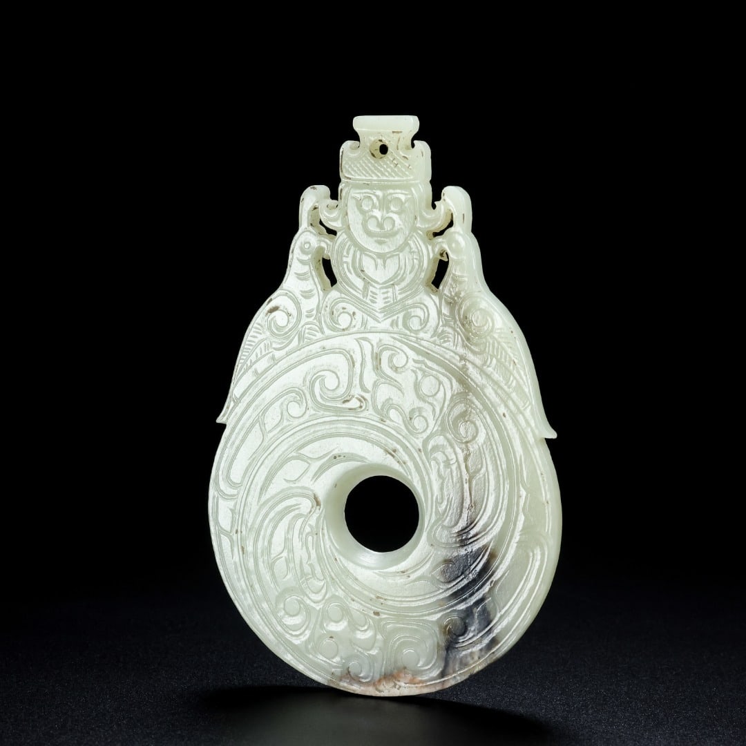 An Exquisite White Jade Figure Pattern Phoenix Pattern Ornament: An Exquisite White Jade Figure Pattern Phoenix Pattern Ornament Han Dynasty, China Size:4.9inx3inx0.2in Weight:97.3g白玉人凤璧 中国汉代