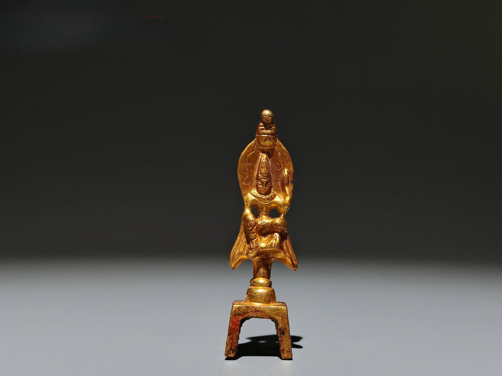 A Exquisite Gilt Bronze Buddha Statue Ornament: A Exquisite Gilt Bronze Buddha Statue Ornament,From 550 to 577 CE, China,Size:3.3inx0.9inx0.7in,Weight:g 铜鎏金佛像摆件,公元550年-577年