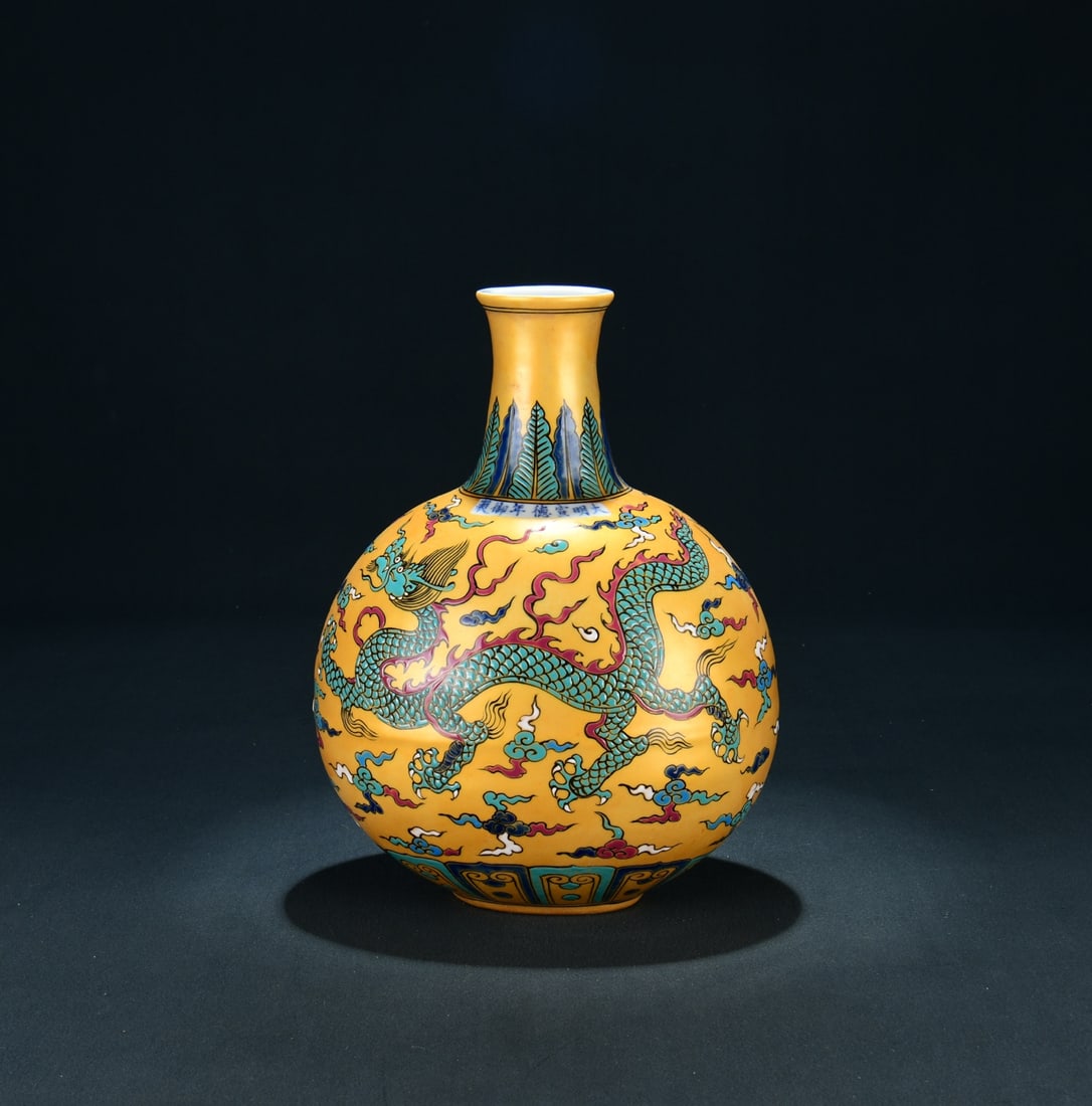 A Exquisite Yellow Ground Wucai Dragon Pattern Vase: A Exquisite Yellow Ground Wucai Dragon Pattern Vase,Ming Dynasty, China,Xuande Six-character Mark,Size:12.6inx9.1in 黄地五彩龙纹瓶,中国明