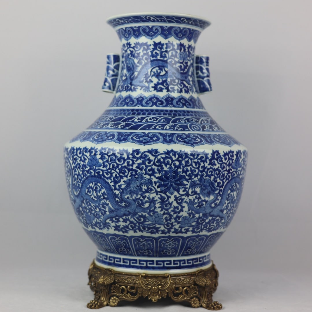 A Exquisite Blue and White Inlaid Copper Dragon Pattern Pierced-Ears Vase: A Exquisite Blue and White Inlaid Copper Dragon Pattern Pierced-Ears Vase,Qing Dynasty, China,Qianlong Six-character Mark,Size:18.9inx7.3inx12.2inx8.9in 青花镶铜龙纹