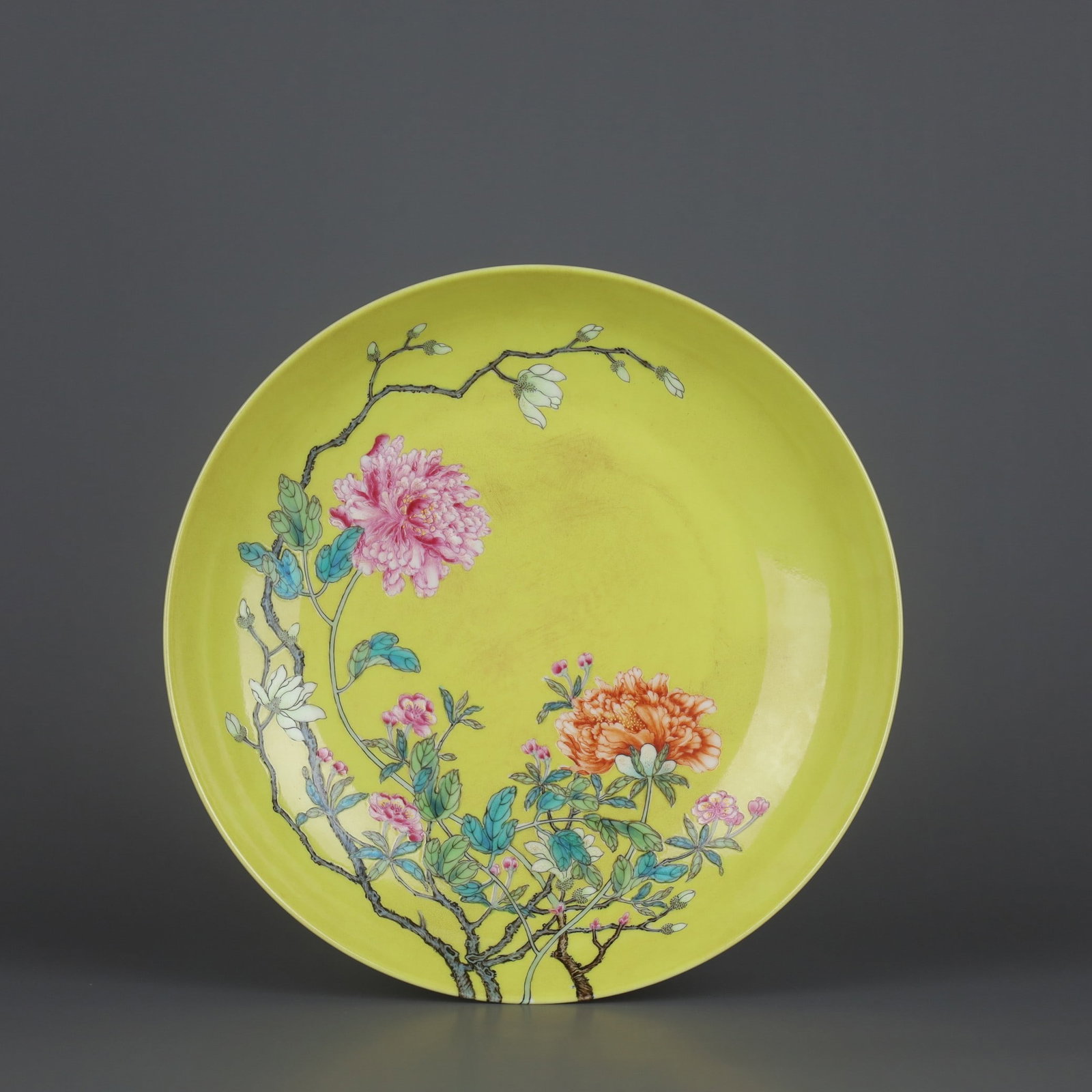 A Exquisite Yellow Glazed Famille-Rose Flower Pattern Plate: A Exquisite Yellow Glazed Famille-Rose Flower Pattern Plate,Qing Dynasty, China,Yongzheng Six-character Mark,Size:1.5inx7.9in 黄釉粉彩花卉纹盘,中&