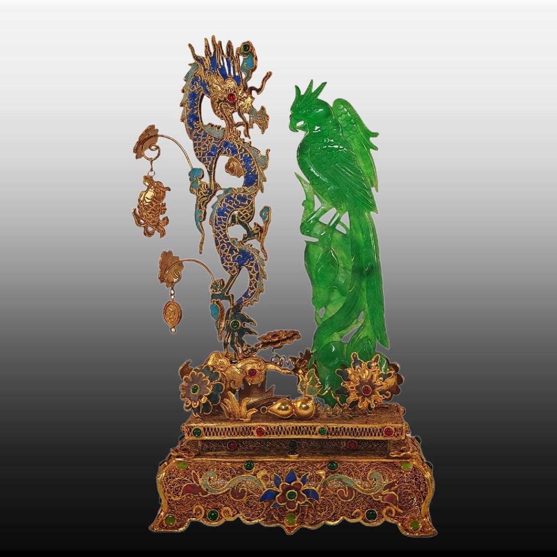 A Exquisite Gilt Bronze Inlaid Jadeite Dragon and Phoenix Ornament: A Exquisite Gilt Bronze Inlaid Jadeite Dragon and Phoenix Ornament,Qing Dynasty, China,Qianlong Four-character Mark,Size:10.8inx5.9in 铜鎏金嵌翡翠龙凤&#