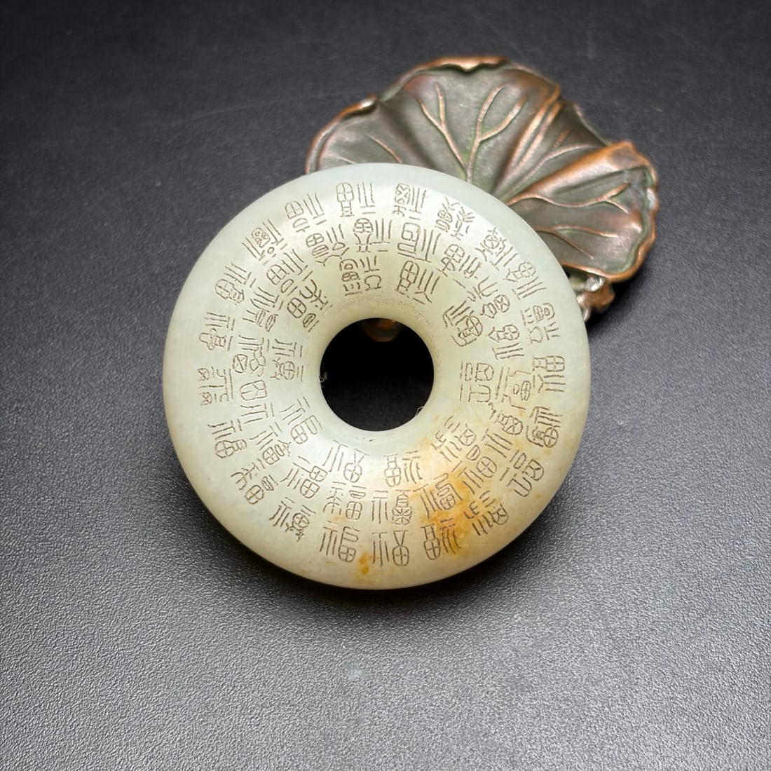 A Exquisite Hotan Jade Hundred Blessing Pattern Handheld Carving: A Exquisite Hotan Jade Hundred Blessing Pattern Handheld Carving,Qing Dynasty, China,Size:2inx0.6in,Weight:72g 和田玉百福纹手把件,中国