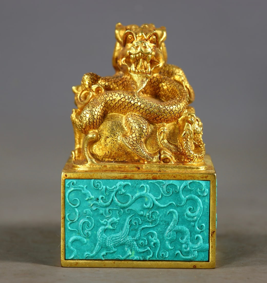 A Exquisite Gilt Copper Inlaid Turquoise Dragon Seal: A Exquisite Gilt Copper Inlaid Turquoise Dragon Seal,Qing Dynasty, China,Size:5.1inx3.1inx3.1in,Weight:3082g 紫铜鎏金镶嵌绿松石龙印