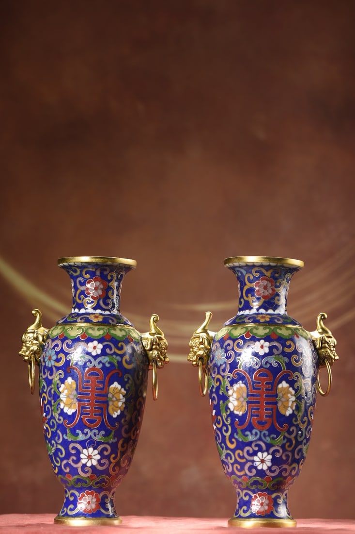 A pair of Exquisite Cloisonne Flower Pattern Beast-Ears Vase: A pair of Exquisite Cloisonne Flower Pattern Beast-Ears Vase,Qing Dynasty, China,Qianlong Four-character Mark,Size:8.9inx2.8in,Weight:2075g 一对景泰蓝花卉 