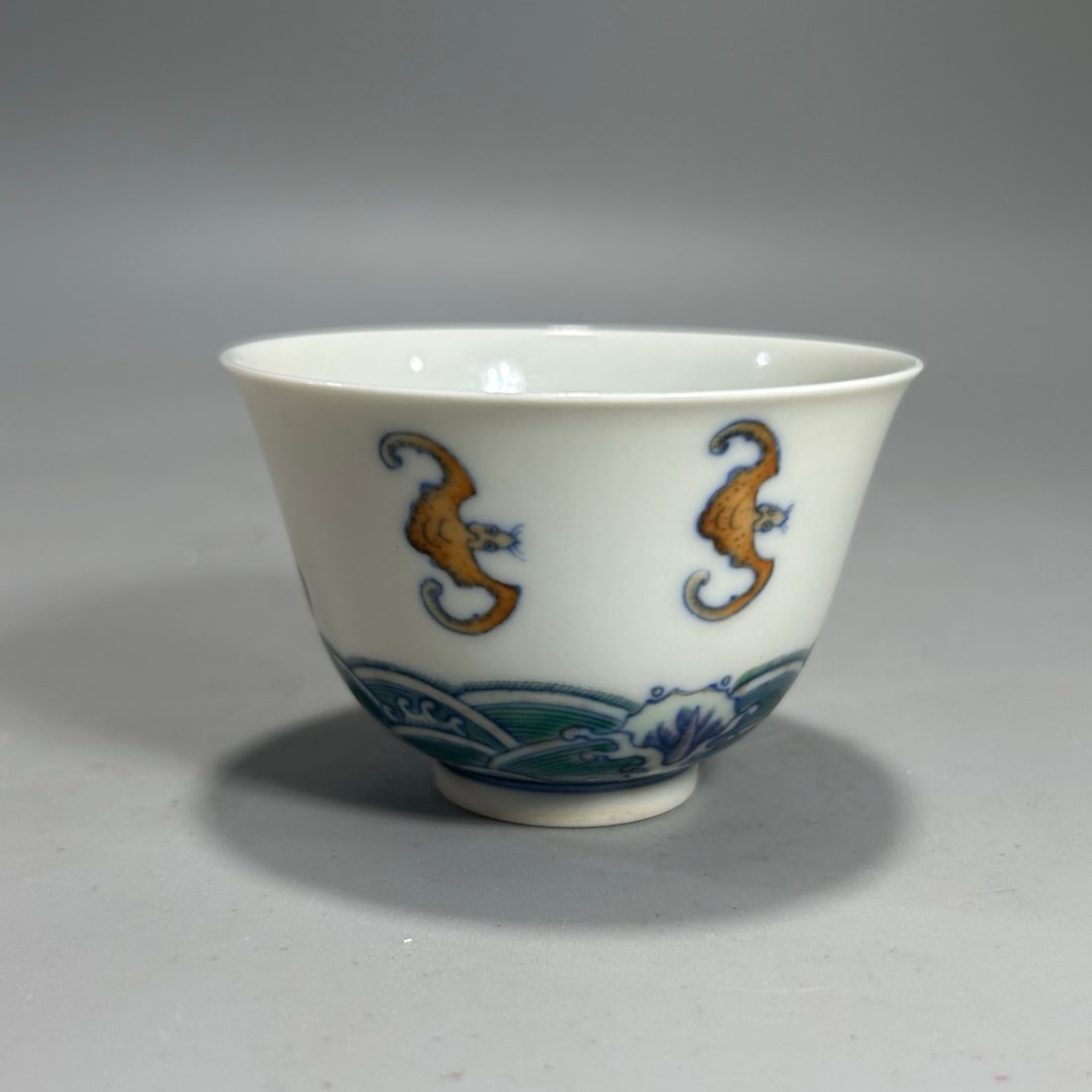 A Exquisite Doucai Bat Pattern Cup: A Exquisite Doucai Bat Pattern Cup,Qing Dynasty, China,Kangxi Six-character Mark,Size:2.9inx2in