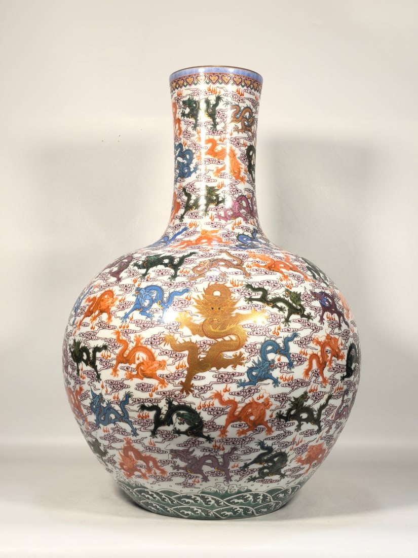 A Exquisite Famille-Rose Dragon Phoenix Pattern Vase: A Exquisite Famille-Rose Dragon Phoenix Pattern Vase,Qing Dynasty, China,Qianlong Six-character Mark,Size:21.3inx4.6inx13.8inx7.2in 粉彩龙凤纹瓶,中国