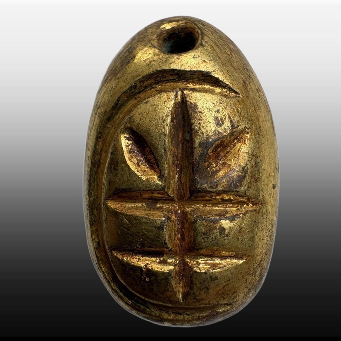 A Exquisite Gilt Bronze Coin: A Exquisite Gilt Bronze Coin,Han Dynasty, China,Size:0.8inx1.2in,Weight:23.6g 铜鎏金鬼脸金钱,中国汉代