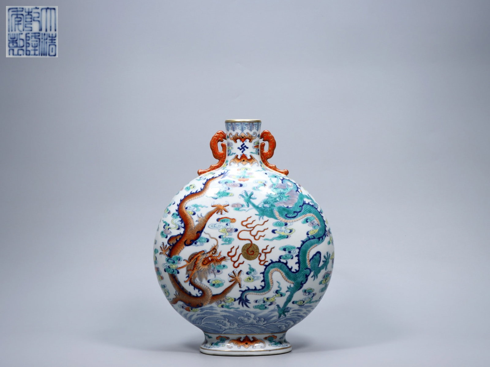 A Exquisite Blue and White Doucai Dragon Pattern Double-Ears Vase: A Exquisite Blue and White Doucai Dragon Pattern Double-Ears Vase,Qing Dynasty, China,Qianlong Six-character Mark,Size:13inx2inx10inx5.1in,Weight:3596g 青花斗彩龙纹