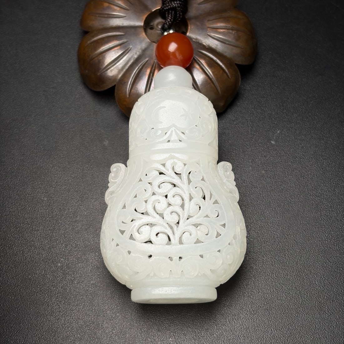 A Exquisite Hotan Jade Sachet: A Exquisite Hotan Jade Sachet,Qing Dynasty, China,Size:2.8inx1.7inx0.9in, Weight:46g 和田玉香囊,中国清代
