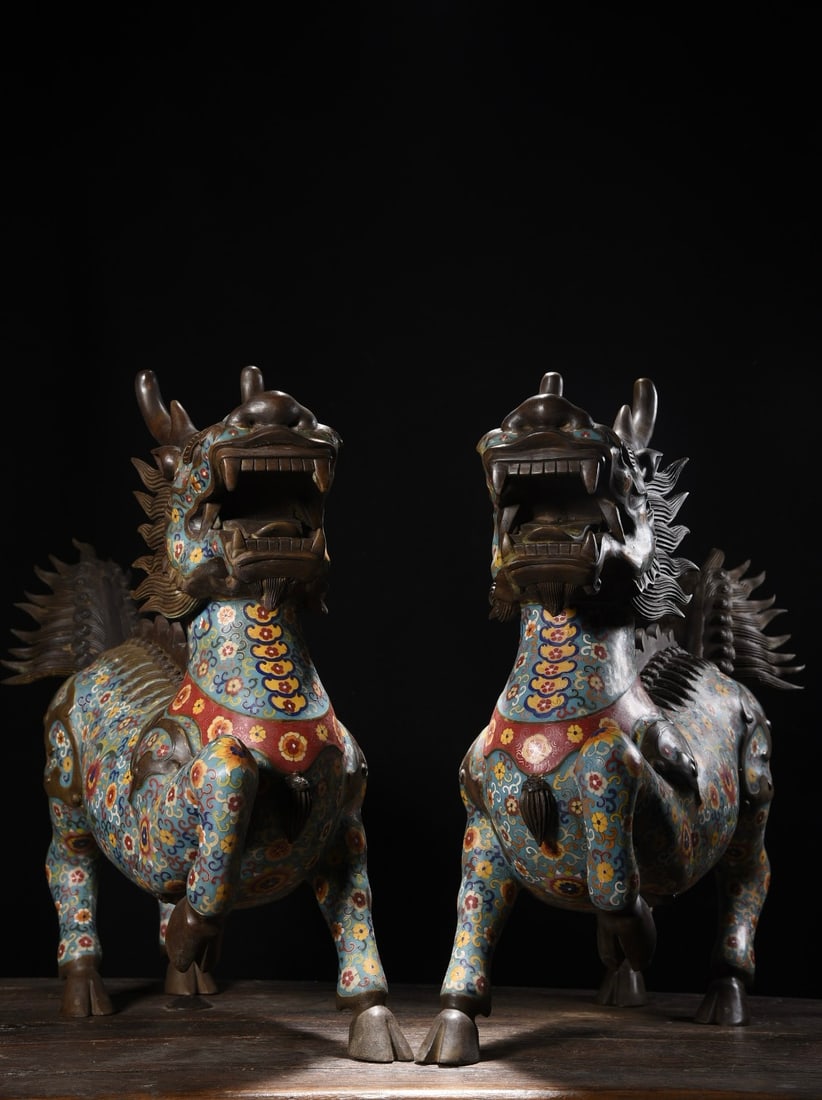 A pair of Exquisite Cloisonne Kylin Ornament: A pair of Exquisite Cloisonne Kylin Ornament,Qing Dynasty, China,Qianlong Four-character Mark,Size:29.9inx8.7inx26in,Weight:52000g 一对景泰蓝麒麟摆Ê