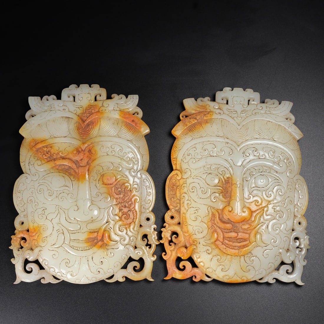 A pair of Exquisite Hotan Jade Mask: A pair of Exquisite Hotan Jade Mask,Han Dynasty, China,With Mark,Size:7.7inx5.5inx0.8in ,Weight:796g 一对和田玉面具,中国汉代,带&