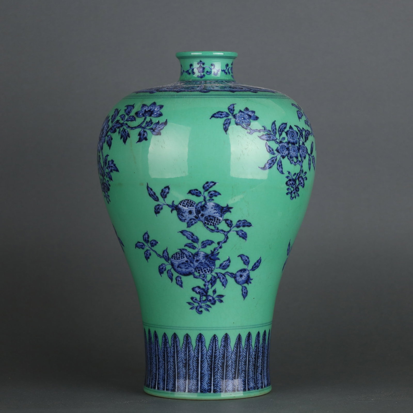 A Exquisite Green Glazed Blue and White Flower and Fruit Pattern Vase: A Exquisite Green Glazed Blue and White Flower and Fruit Pattern Vase,Qing Dynasty, China,Qianlong Six-character Mark,Size:12.7inx8.3in 绿釉青花花果纹瓶