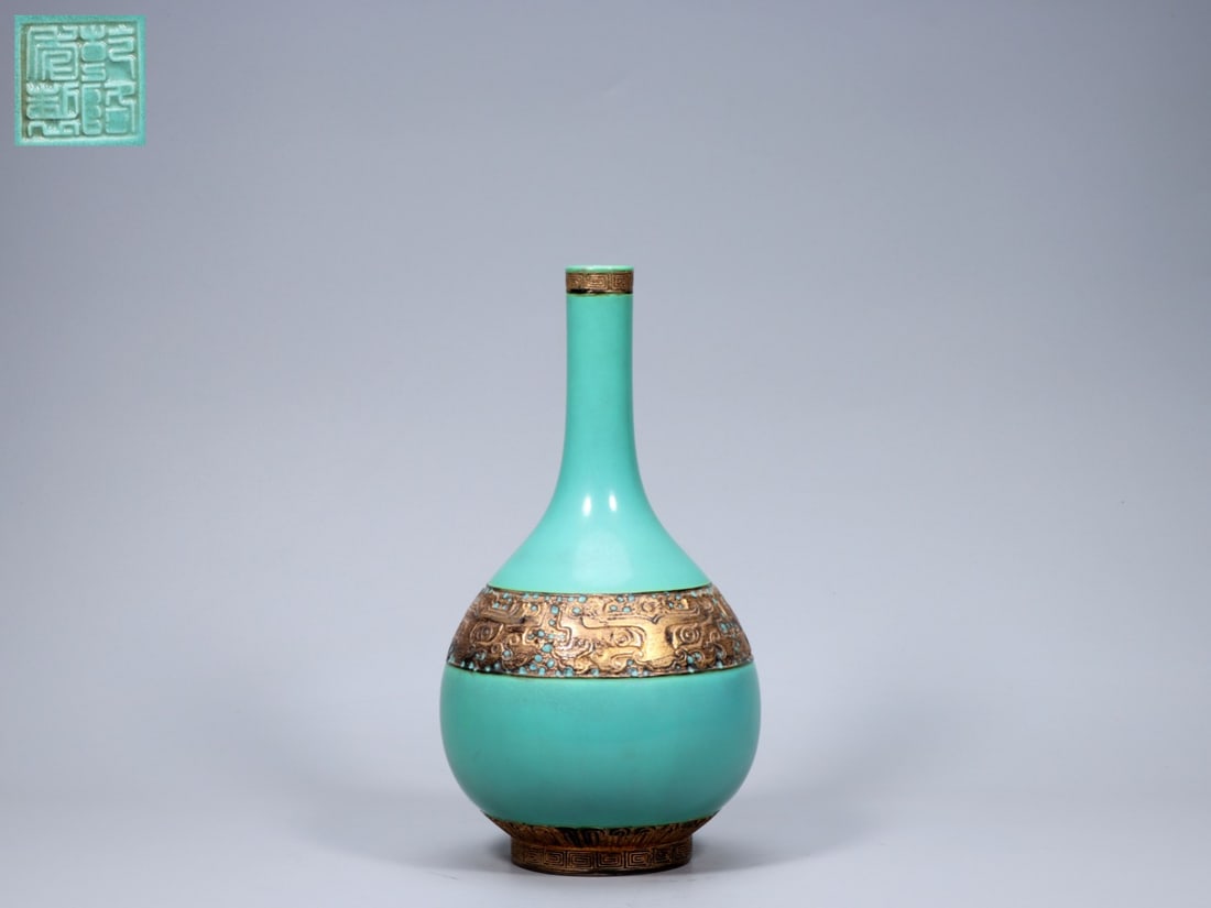 A Exquisite Turquoise-Glazed Bronze Color Dragon Pattern Vase: A Exquisite Turquoise-Glazed Bronze Color Dragon Pattern Vase,Qing Dynasty, China,Qianlong Four-character Mark,Size:11inx1.3inx5.9inx3.4in,Weight:964g 松石绿釉古铜&