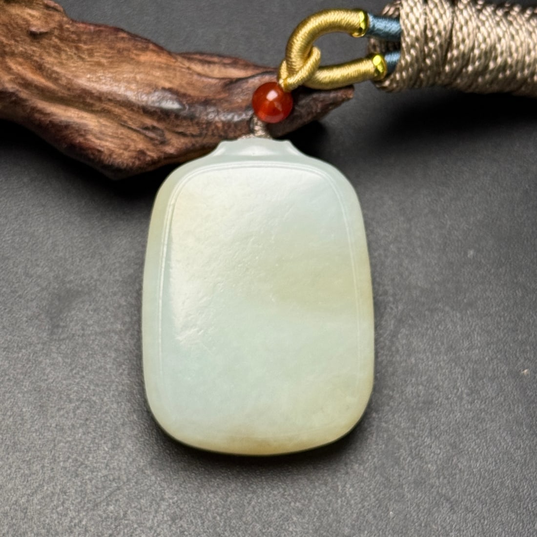 A Exquisite Hotan Pendant: A Exquisite Hotan Pendant,Qing Dynasty, China,Size:1.4inx1.9inx0.5in ,Weight:49g 和田玉吊坠,中国清代