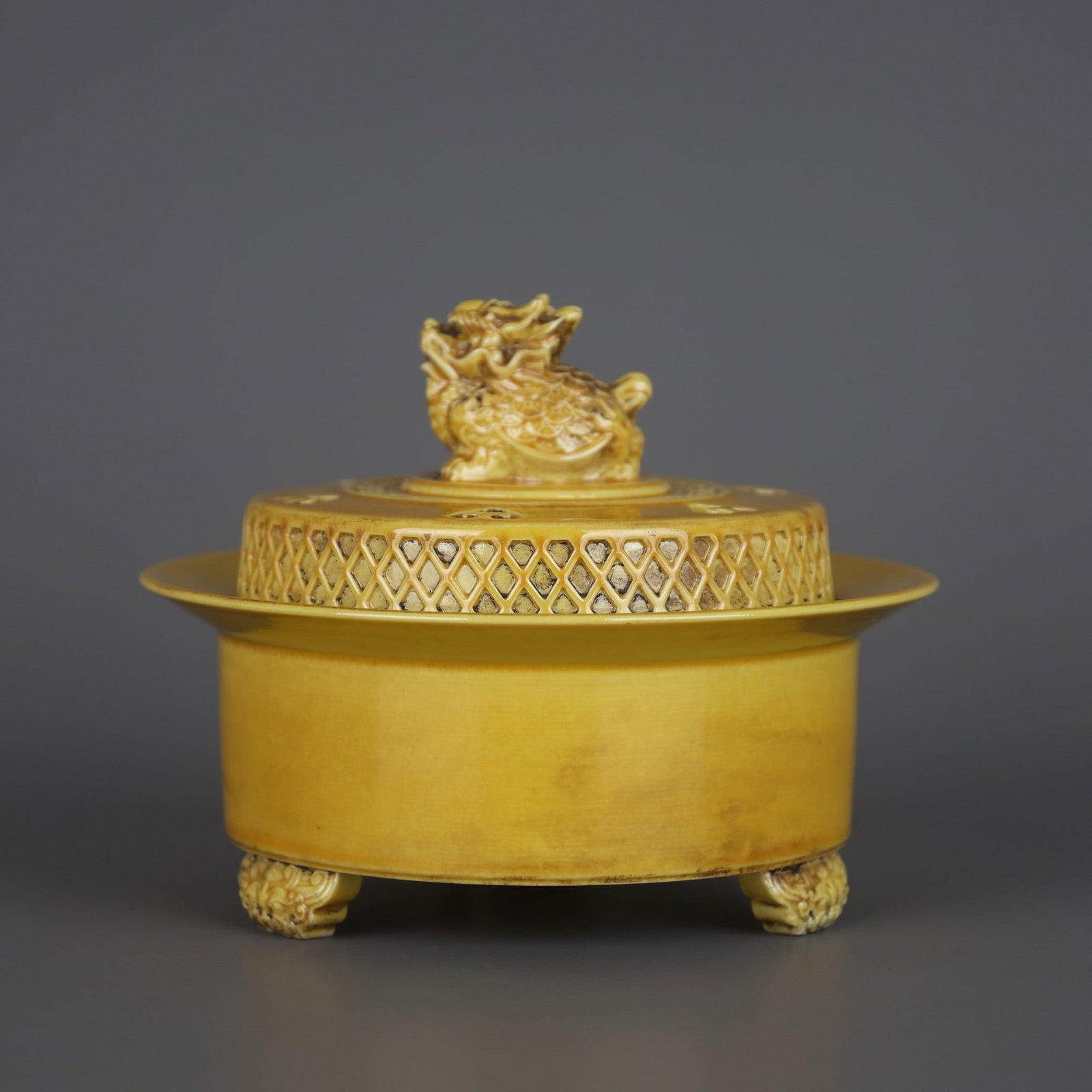 A Exquisite Yellow Glazed Tripod Censer: A Exquisite Yellow Glazed Tripod Censer,Qing Dynasty, China,Qianlong Six-character Mark,Size:3.4inx4.5in