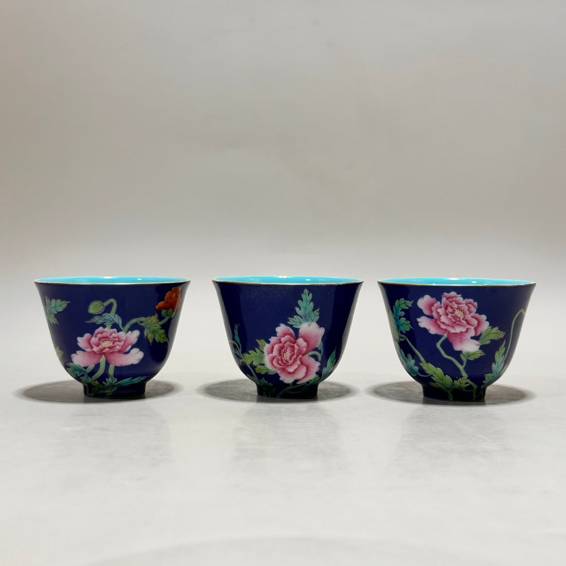 A Set of Exquisite Ji Blue Glazed Flower Pattern Cup: A Set of Exquisite Ji Blue Glazed Flower Pattern Cup,Qing Dynasty, China,Qianlong Four-character Mark,Size:2.4inx2.5inx1.4in 一套霁蓝釉花卉纹杯,&#