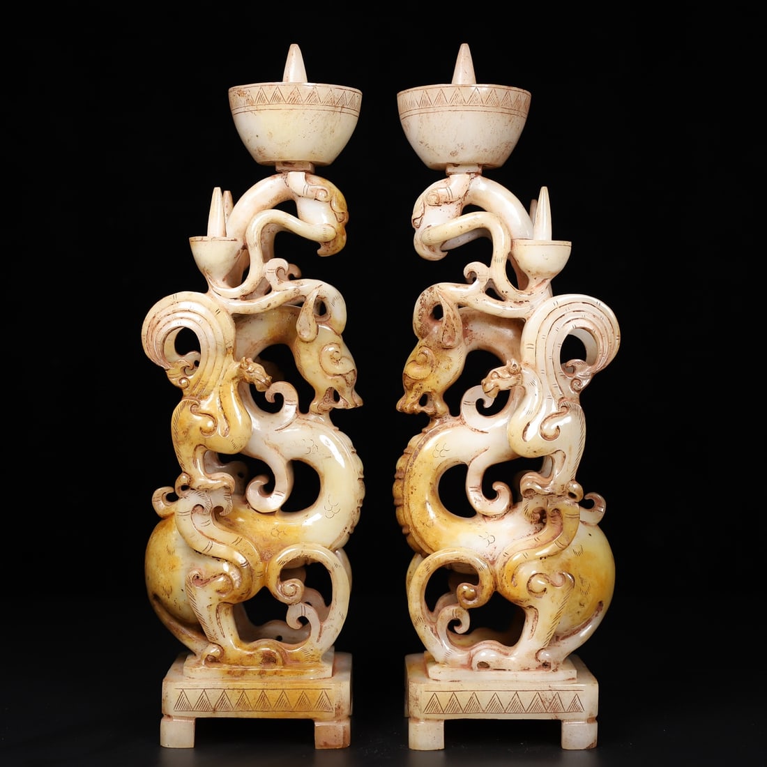 A pair of Exquisite Hotan Jade Candlestick: A pair of Exquisite Hotan Jade Candlestick,Qing Dynasty, China,Size:2.6inx2.6inx9.8in ,Weight:874g 一对和田玉烛台,中国清代