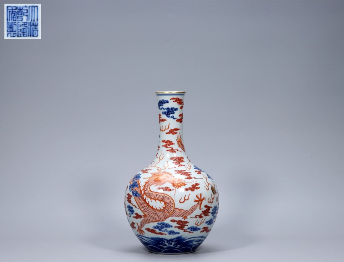 A Exquisite Blue and White Iron-Red Dragon Pattern Vase: A Exquisite Blue and White Iron-Red Dragon Pattern Vase,Qing Dynasty, China,Qianlong Six-character Mark,Size:10.8inx2inx6.5inx3.1in,Weight:1141g 青花矾红龙纹瓶