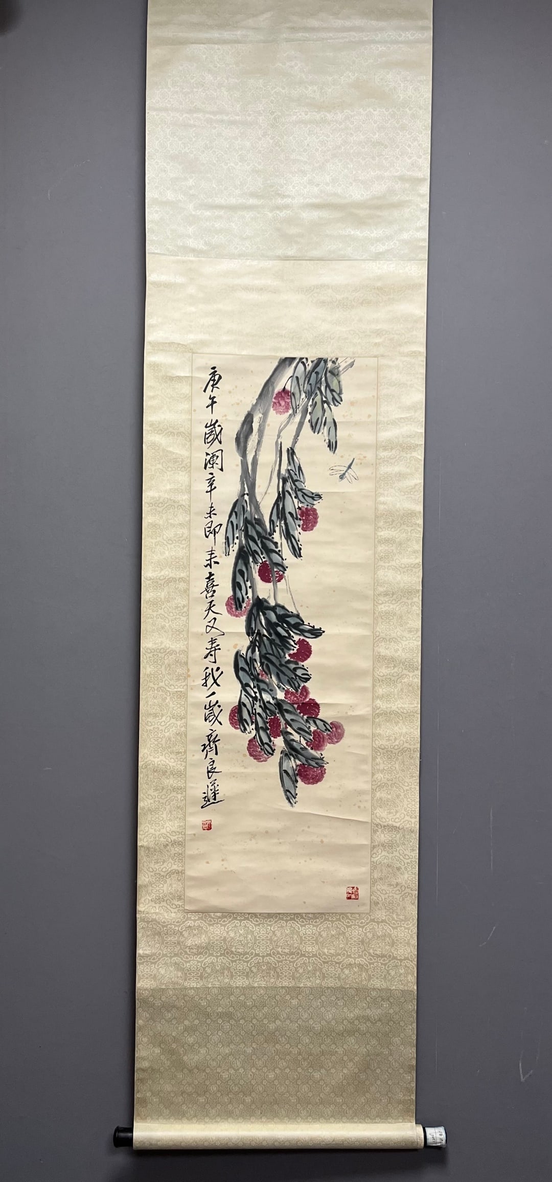 A Chinese Vertical Scroll Ink Painting of Flower and Fruit on Paper: A Chinese Vertical Scroll Ink Painting of Flower and Fruit on Paper,Modern Period of China,Qi Liangchi,without frame size:40.6inx13.4in